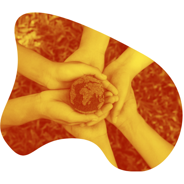 Mani che si uniscono reggendo un piccolo pianeta terra